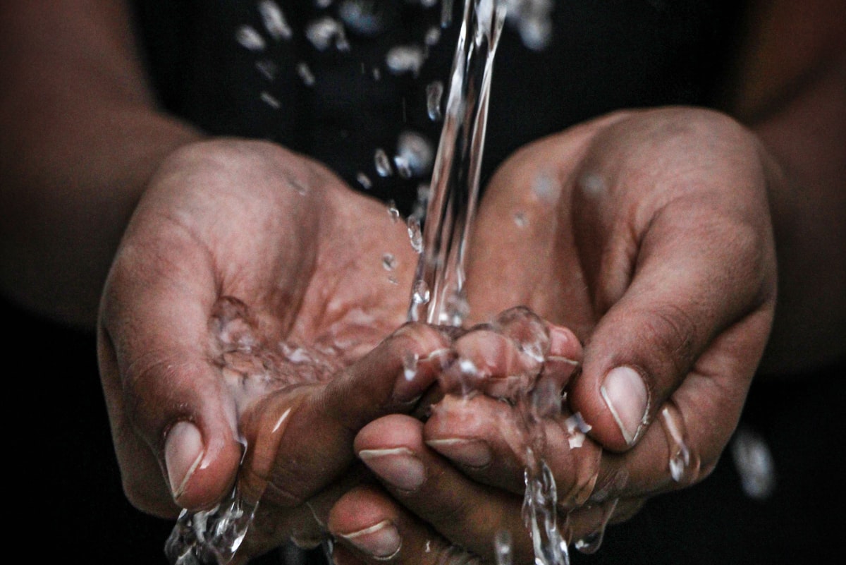 Clean water flowing from a new village tap