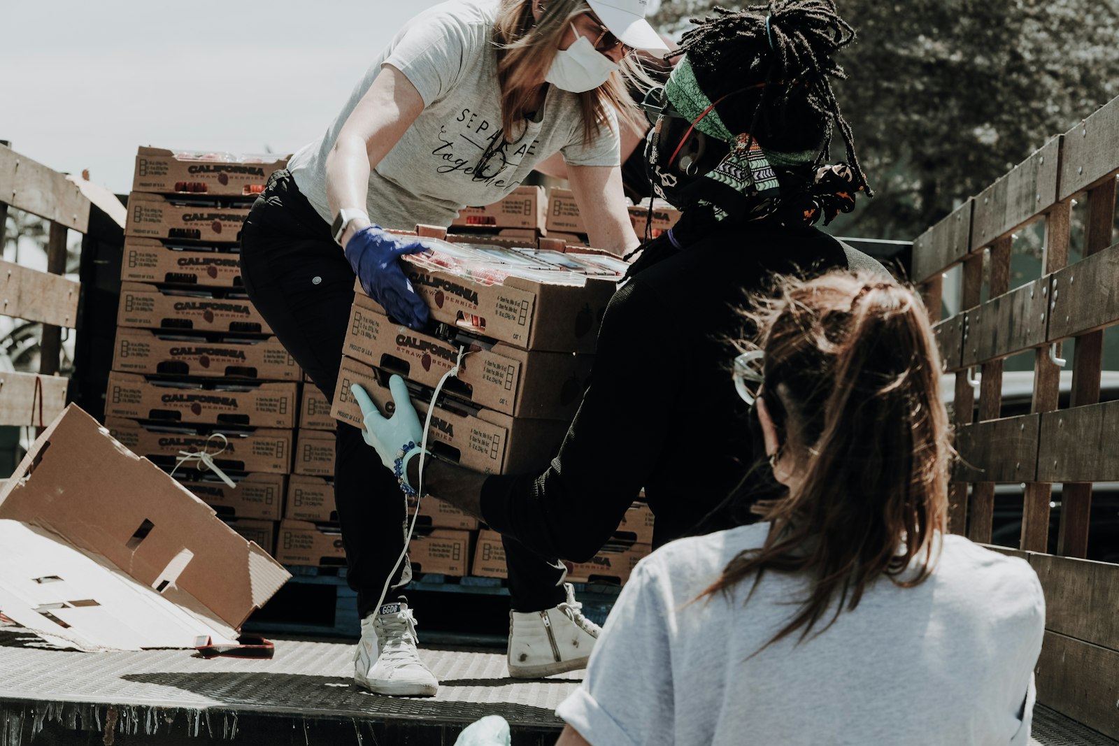 Volunteers joining hands for the community